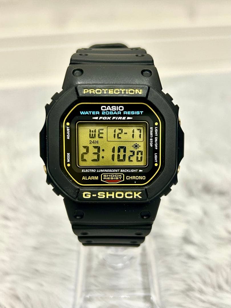 アッツG-SHOCK DW-5600Eゴールド液晶 FOXFIRE