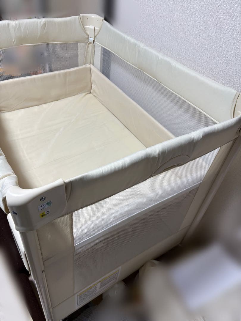 アップリカ　折り畳みベビーベッド ココネルエアー ミルクホワイト