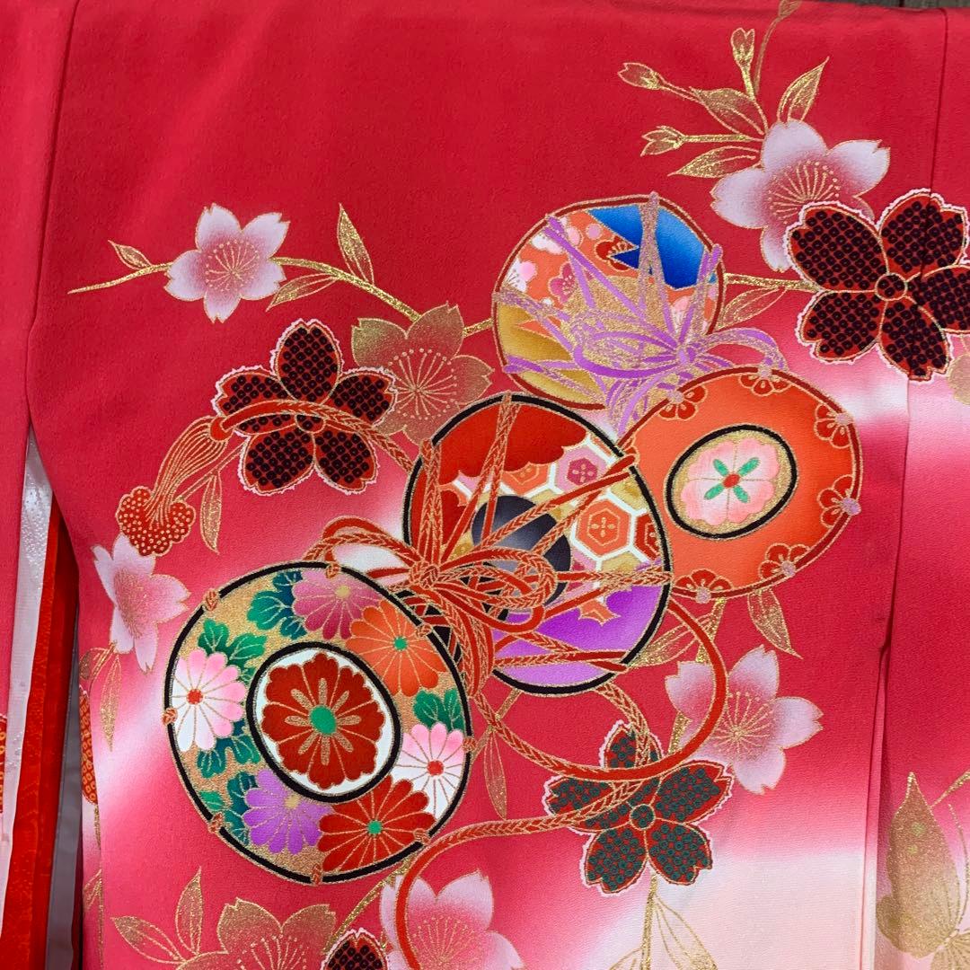 赤とピンクのグラデーション鼓模様お宮参り着物（内袖・長襦袢）