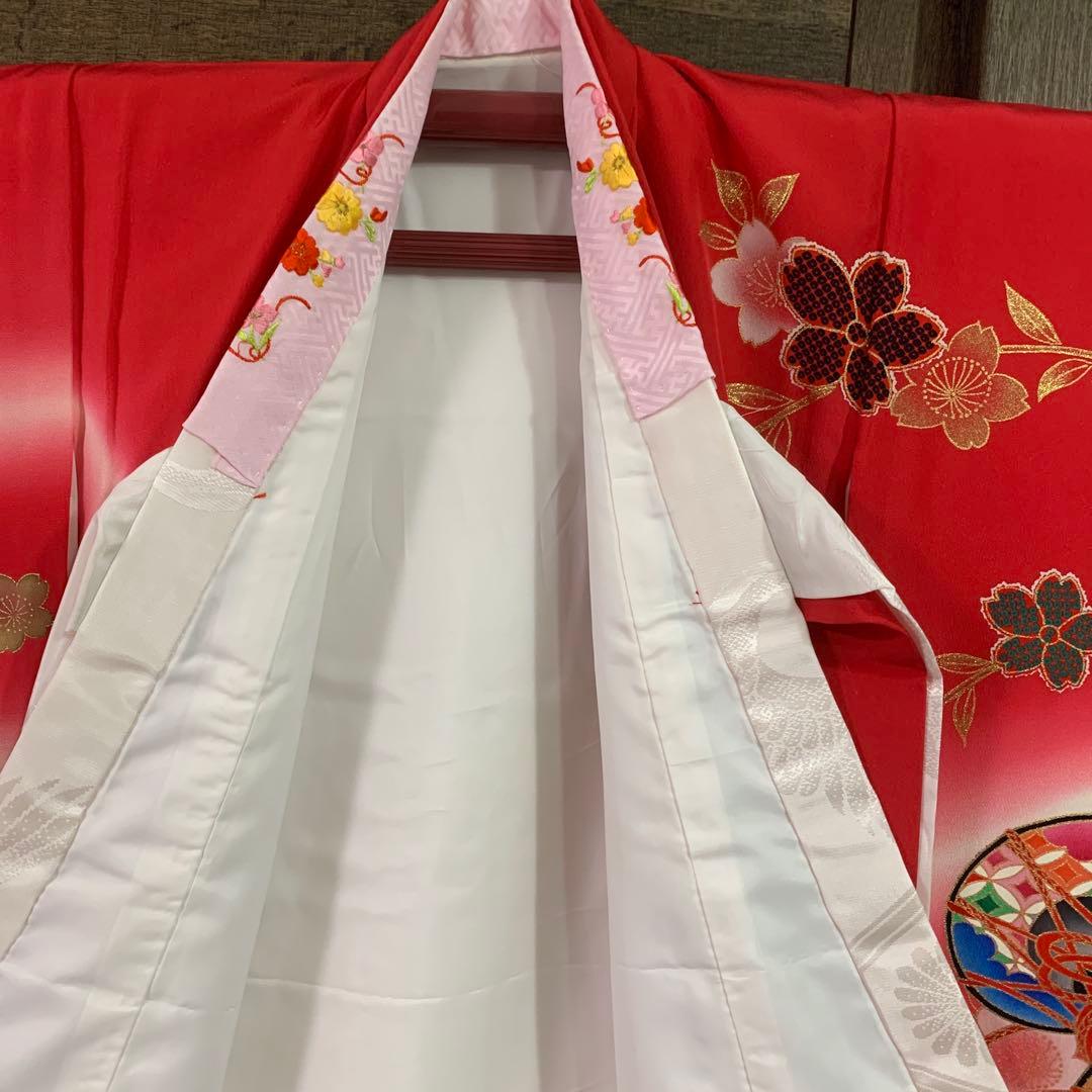 赤とピンクのグラデーション鼓模様お宮参り着物（内袖・長襦袢）