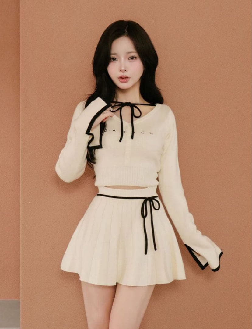 darich ダーリッチ ウエストオープンリボンデザインニットミニワンピース