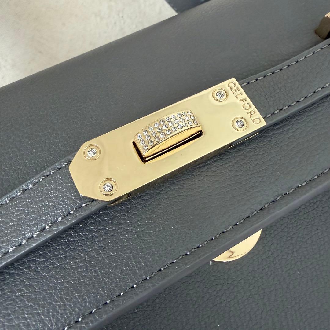 セルフォード　ビジューツイストバックルハンドバッグ　グレー