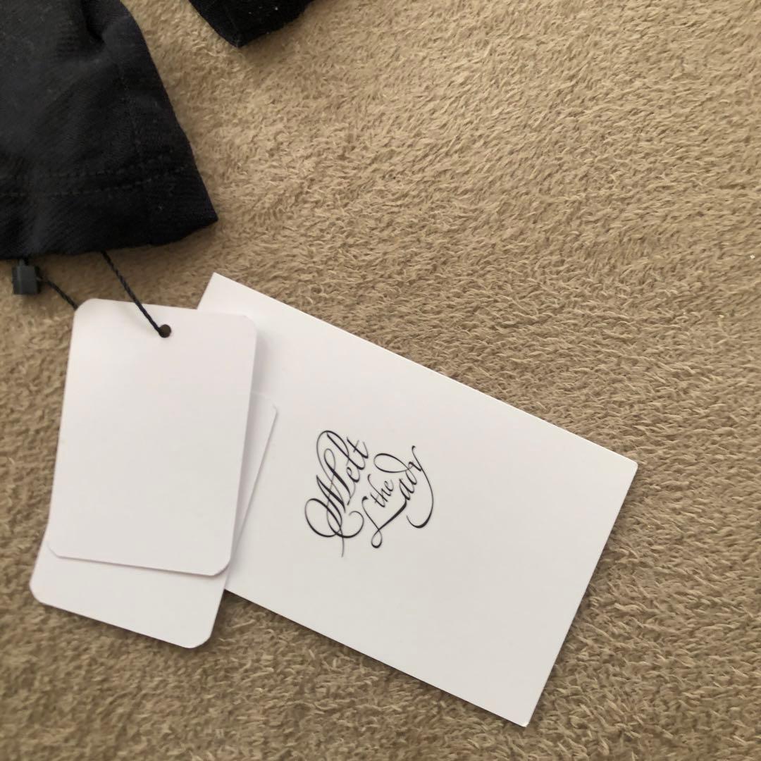 \ 新品・未使用 / メルト ザ レディ sheer hook topsブラック