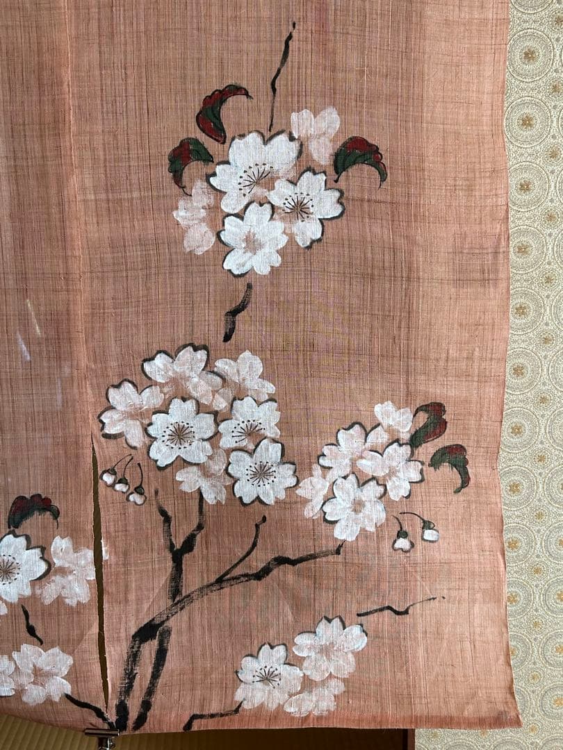 桜の花模様の薄いピンクのれん
