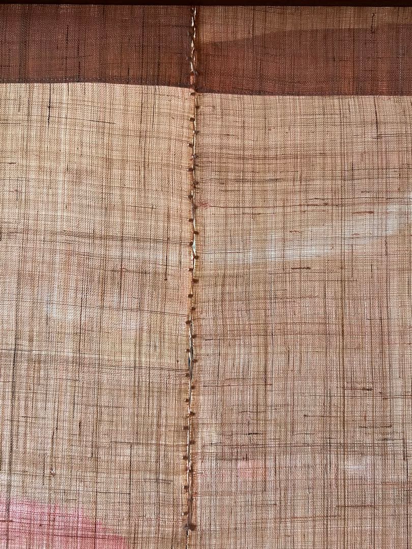 桜の花模様の薄いピンクのれん