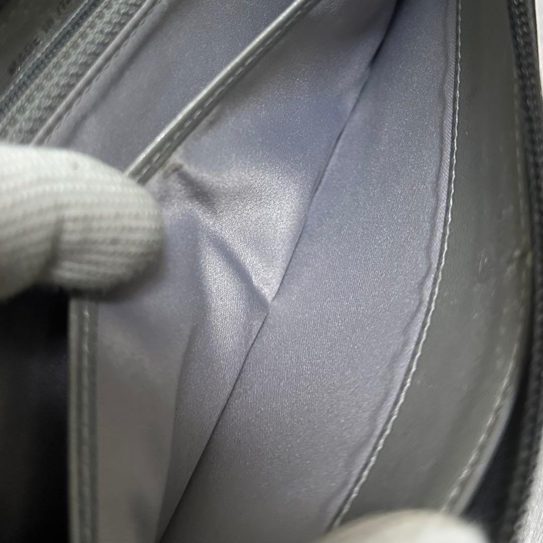 CHANEL シャネル　長財布　ラウンドファスナー　カメリア　ラムスキン