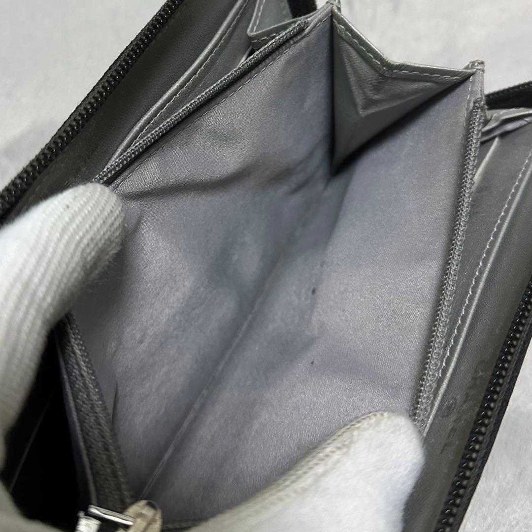 CHANEL シャネル　長財布　ラウンドファスナー　カメリア　ラムスキン