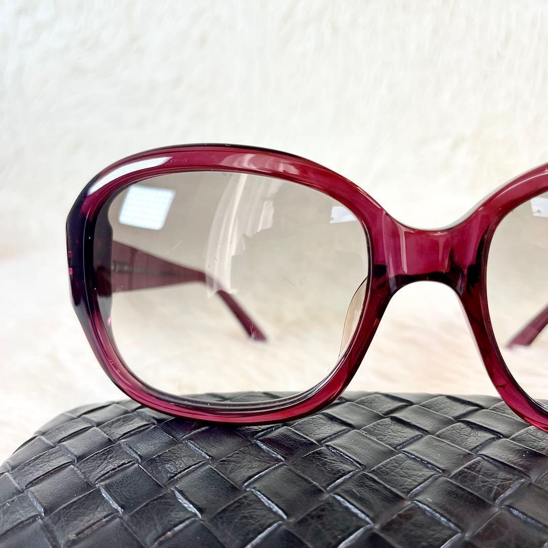 美品　PRADA　サングラス　SPR26G　ブラウンレンズ　レッドクリアフレーム