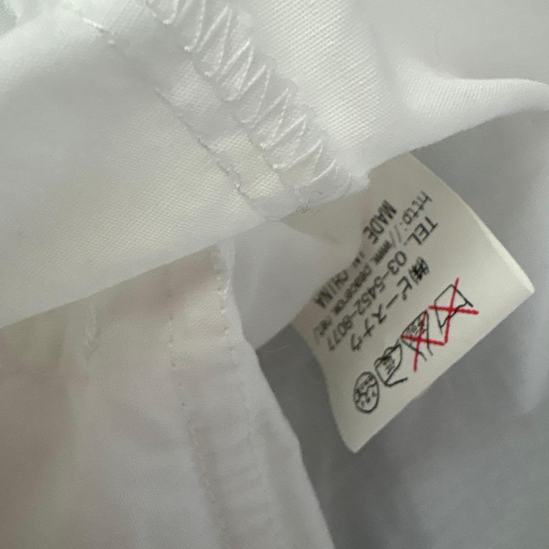 ブラックピースナウ　ホワイト長袖シャツ