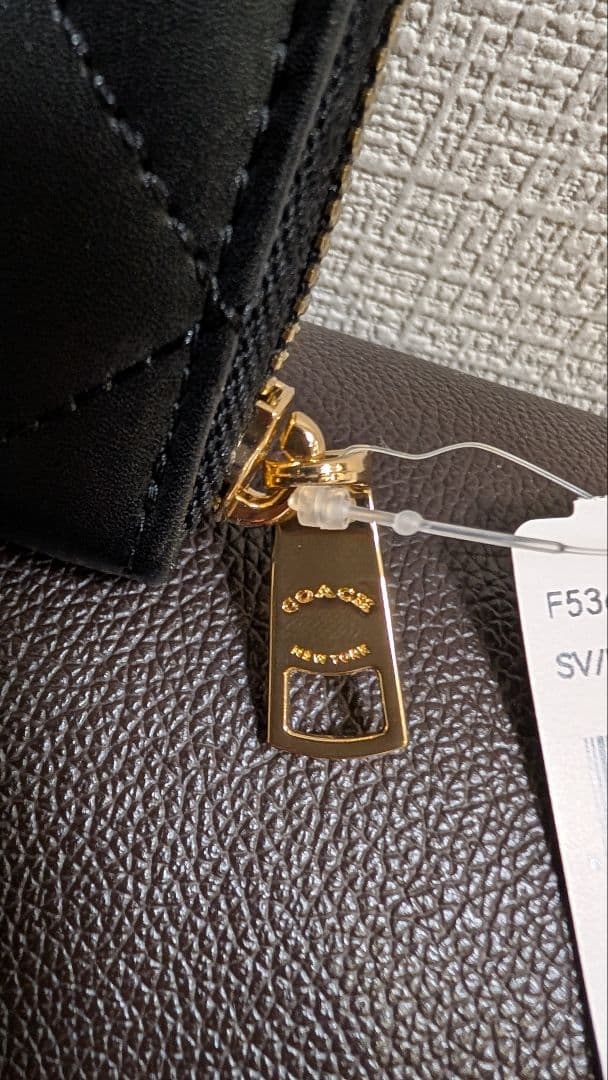 ◇新品未使用COACH キルティング ブラック長財布