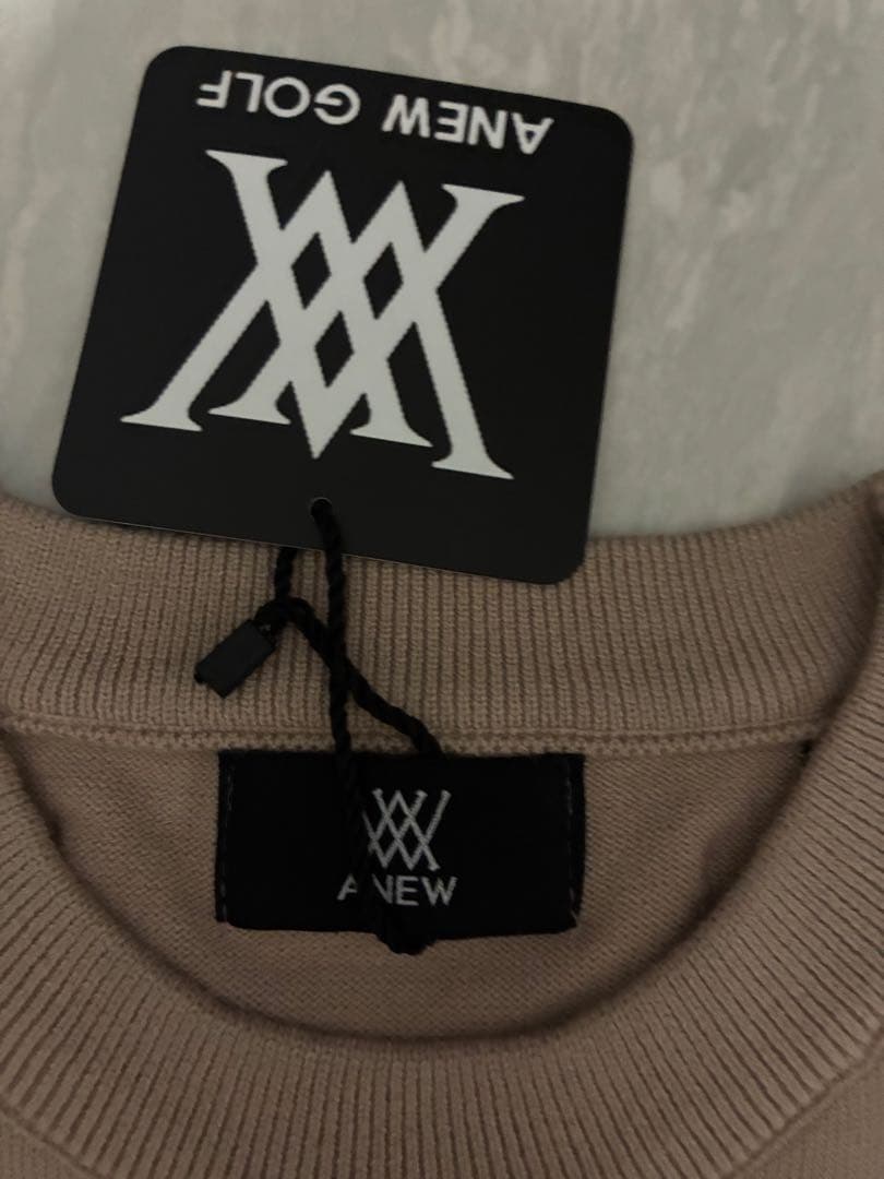 新品未使用！海外購入A NEW GOLF ロゴプリントセーター ベージュSサイズ