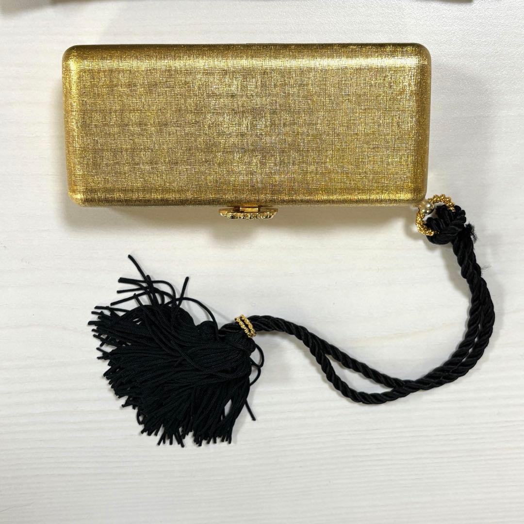 【美品・袋付き】ELIZABETH ARDEN のクラッチバッグ