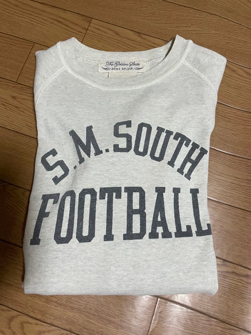 REMI RELIEF FOOTBALL RAGLAN L/S Tシャツ