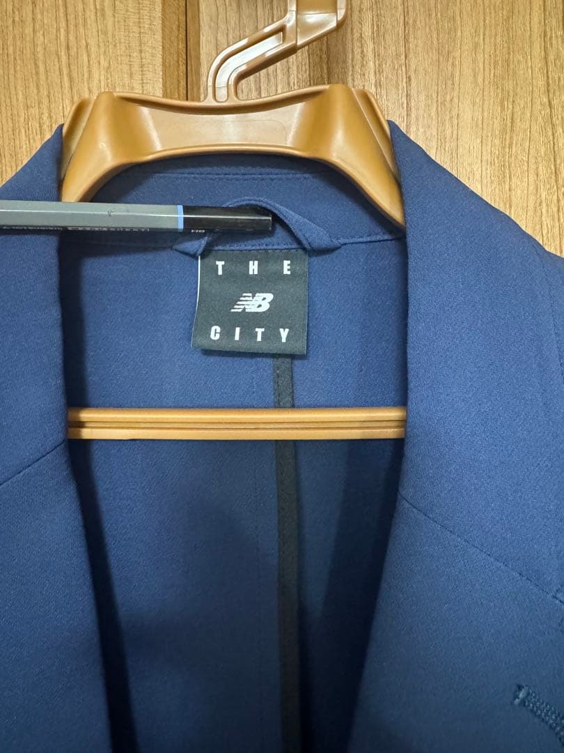 ニューバランス メンズ THE CITY ジャケット パンツ 上下セット ブルー