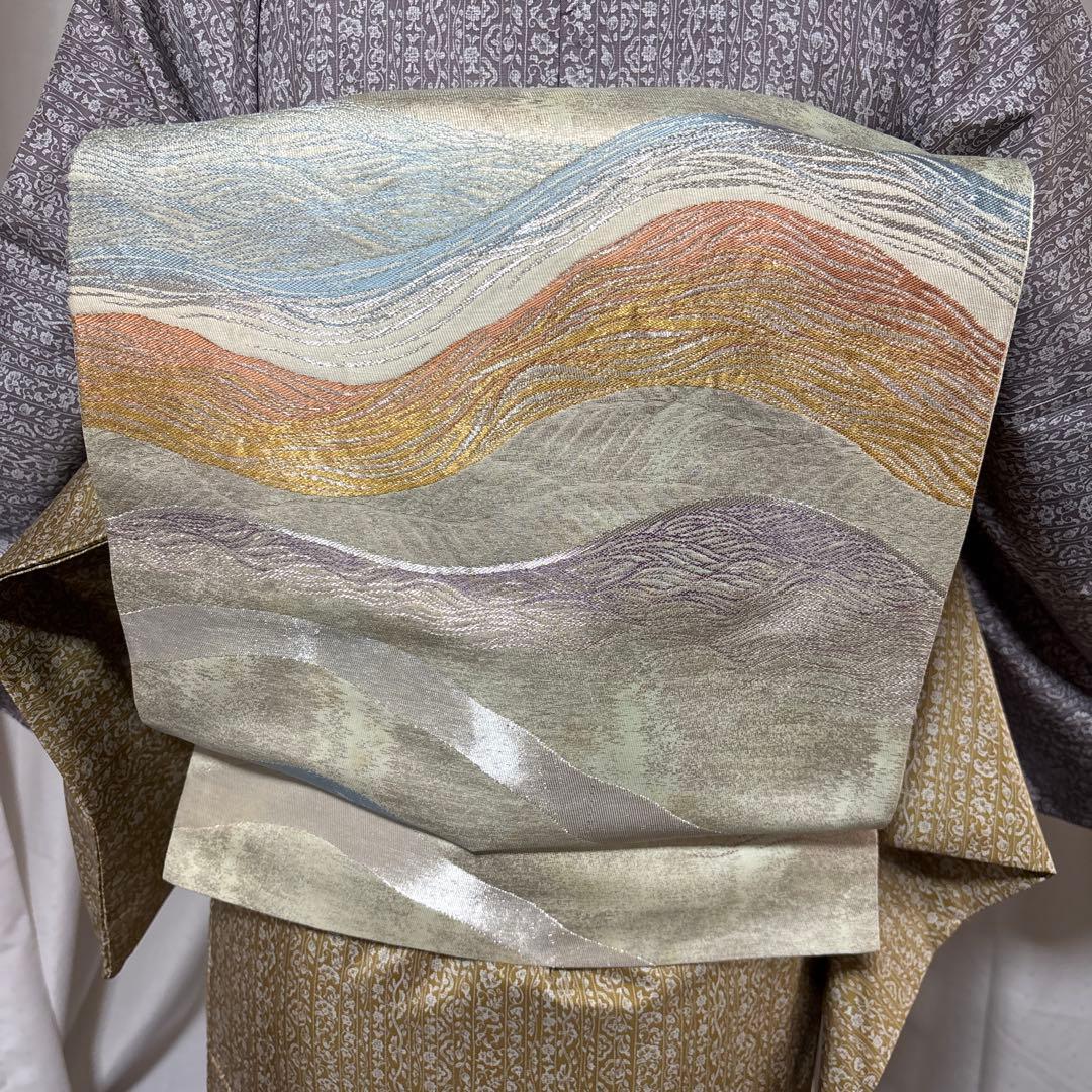 未使用近い　美品　袷　正絹　本場大島紬　フルセット　西陣綴れ織り袋帯