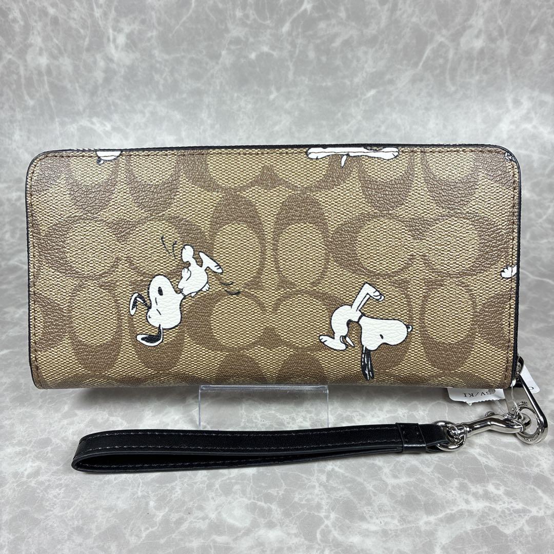 【未使用級】COACH×スヌーピー コラボ長財布 シグネチャー 保管袋付き