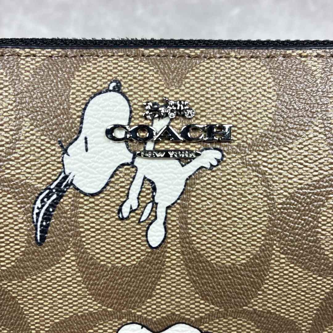 【未使用級】COACH×スヌーピー コラボ長財布 シグネチャー 保管袋付き