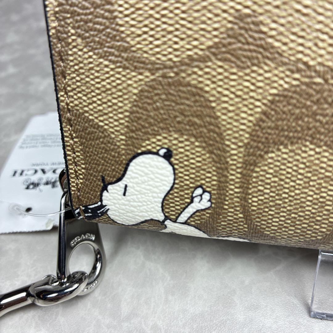 【未使用級】COACH×スヌーピー コラボ長財布 シグネチャー 保管袋付き