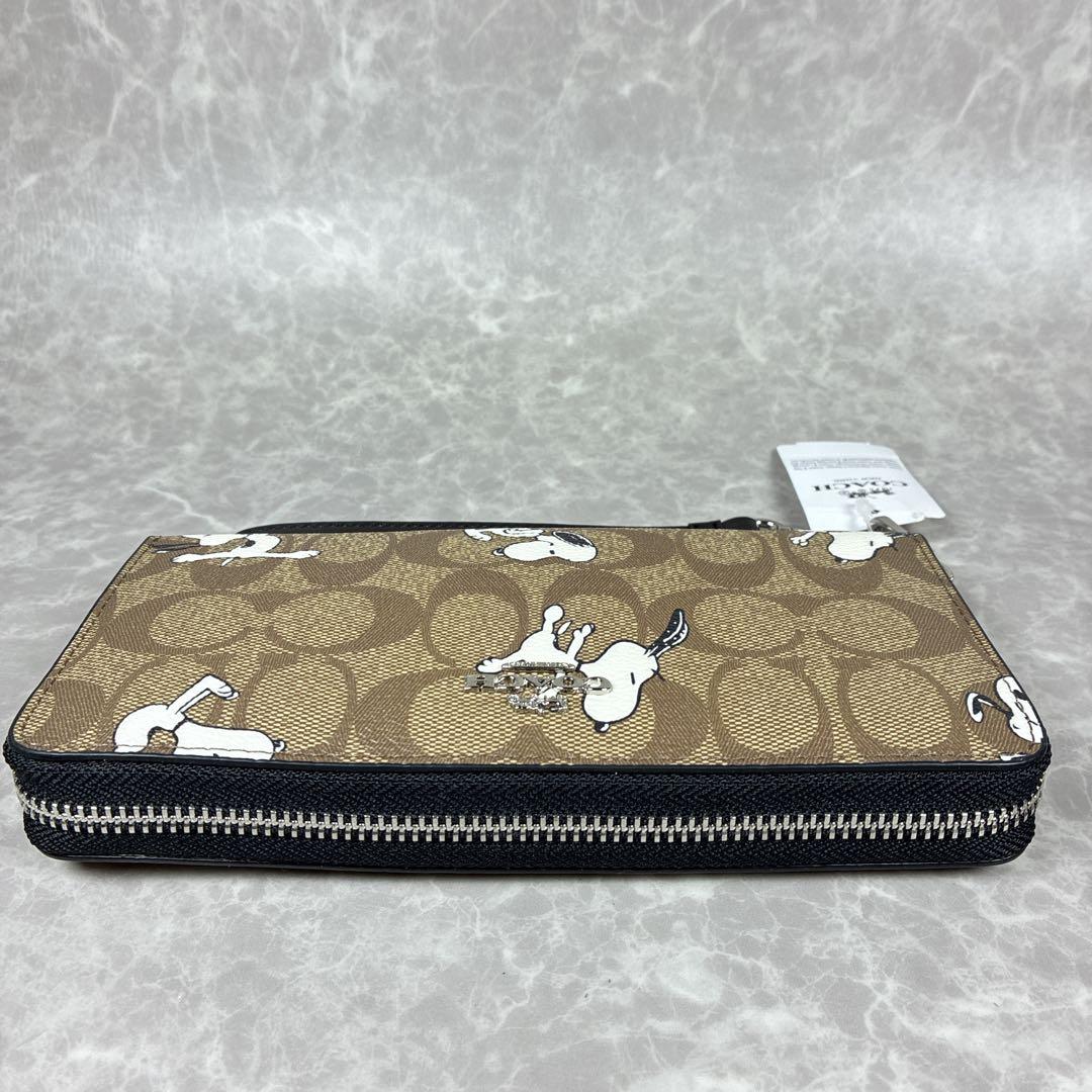 【未使用級】COACH×スヌーピー コラボ長財布 シグネチャー 保管袋付き