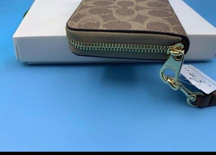 新品未使用コーチ長財布ブラウンシグネチャーレディースメンズ送料無料即日発送