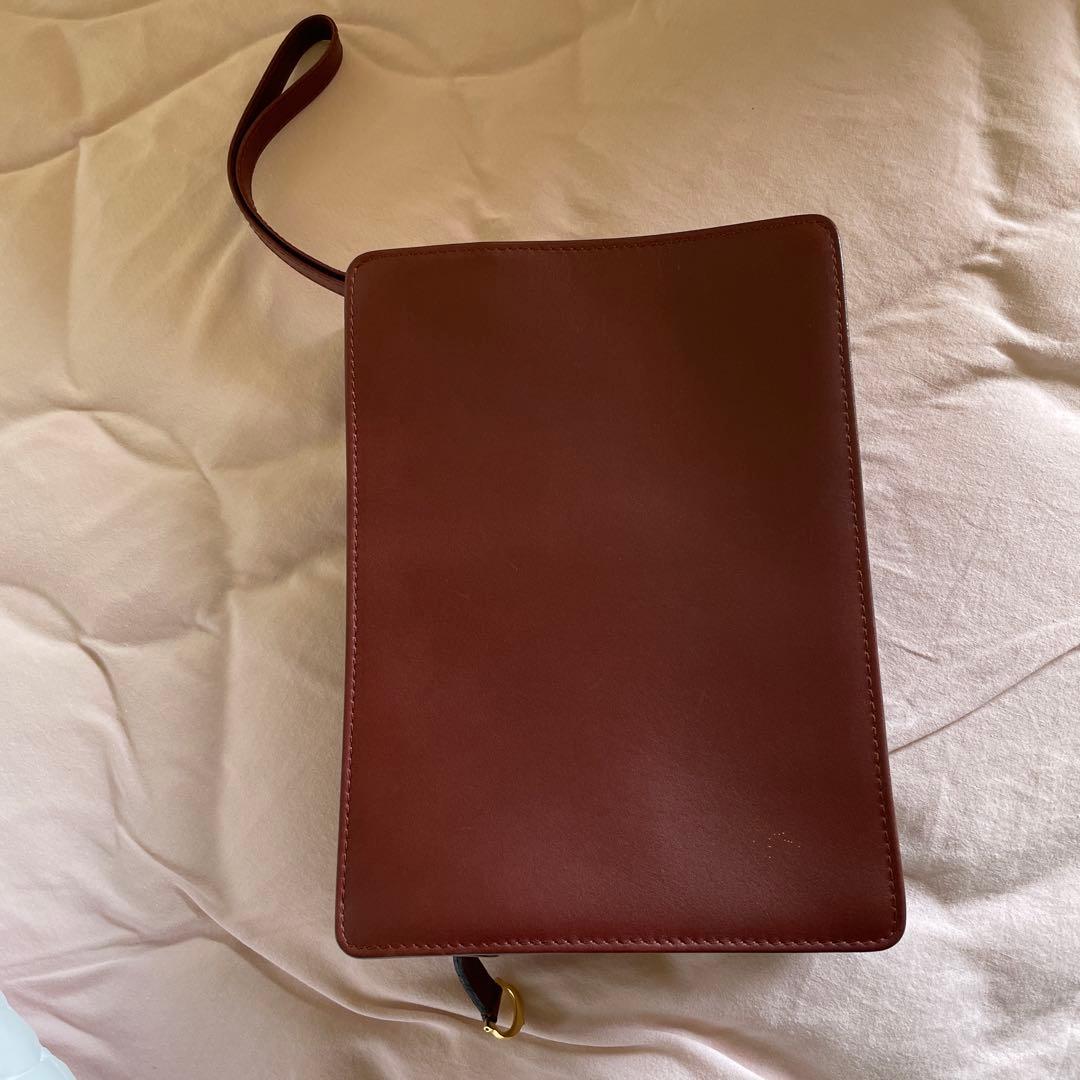 未使用　極美品　カルティエCartier ハンドバッグ　クラッチバッグ　エンジ色