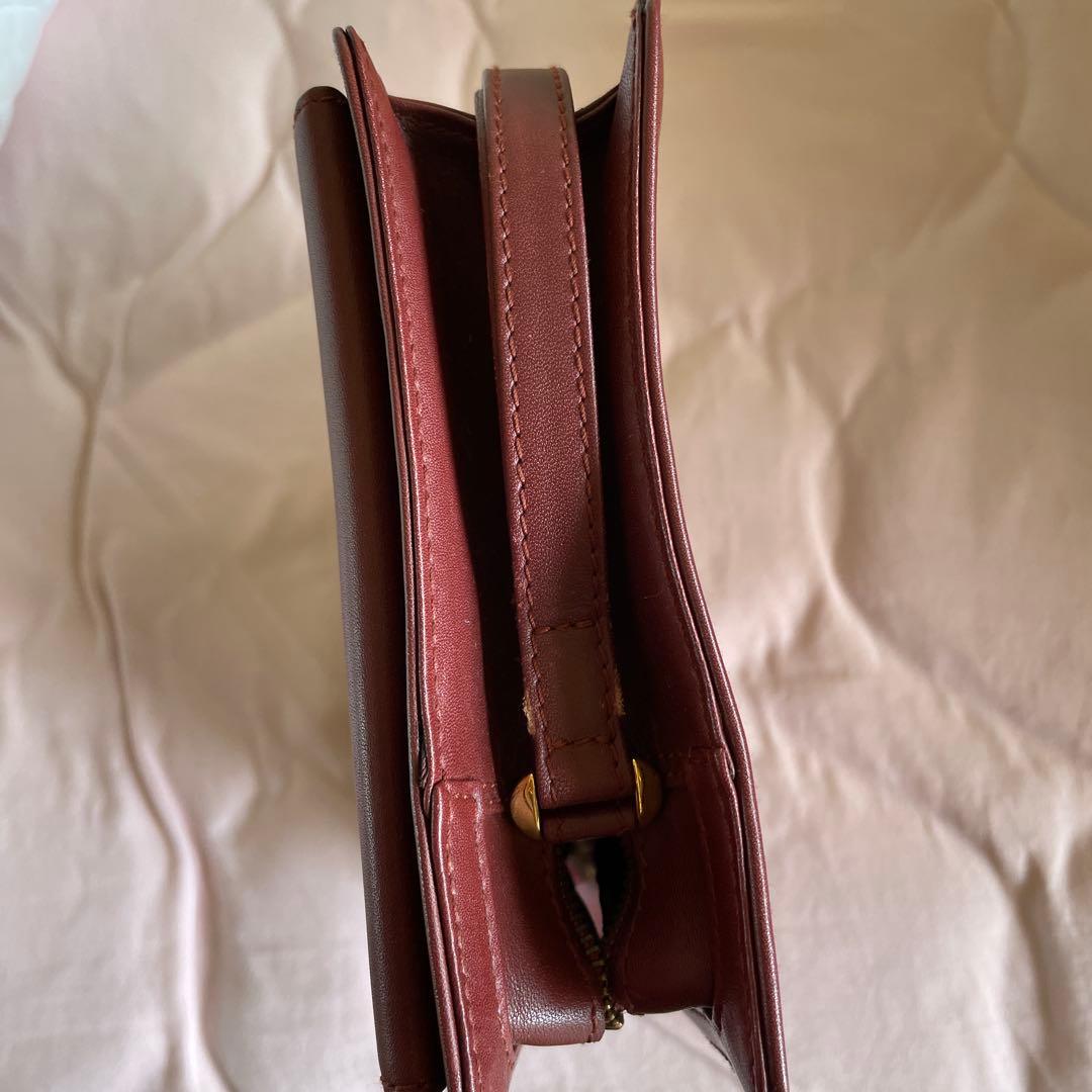 未使用　極美品　カルティエCartier ハンドバッグ　クラッチバッグ　エンジ色