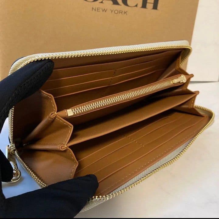 新品未使用コーチ長財布シグネチャーブラウンストラップ付きレディースメンズ送料無料