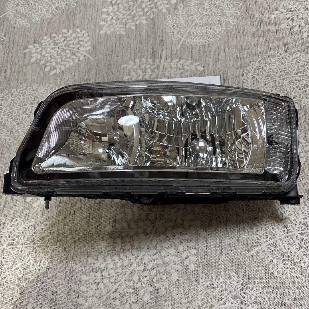 三菱ふそう　ファイター　ヘッドライト　左　ディスチャージ　たもつ