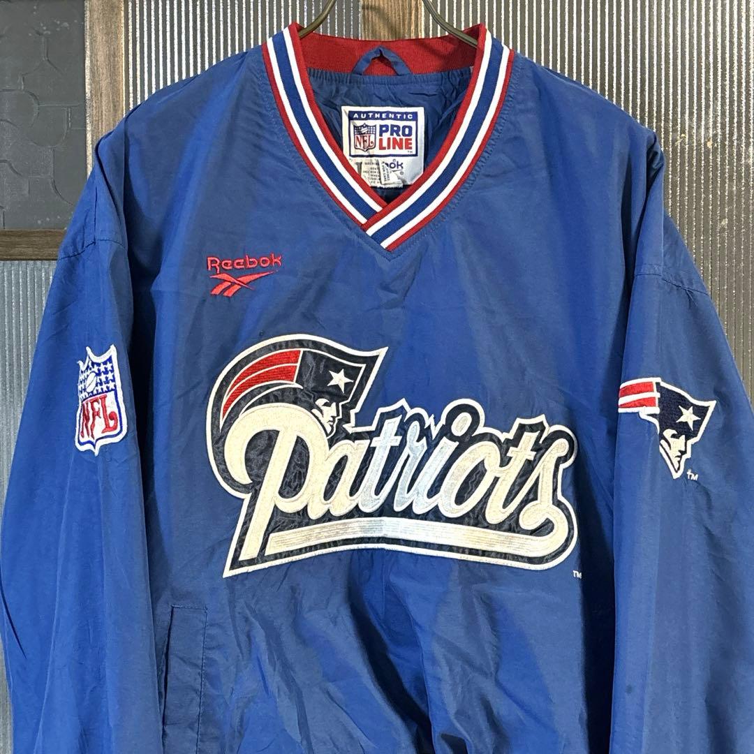 90s US古着　Reebok NFL ナイロンプルオーバー　M 青バック刺繍