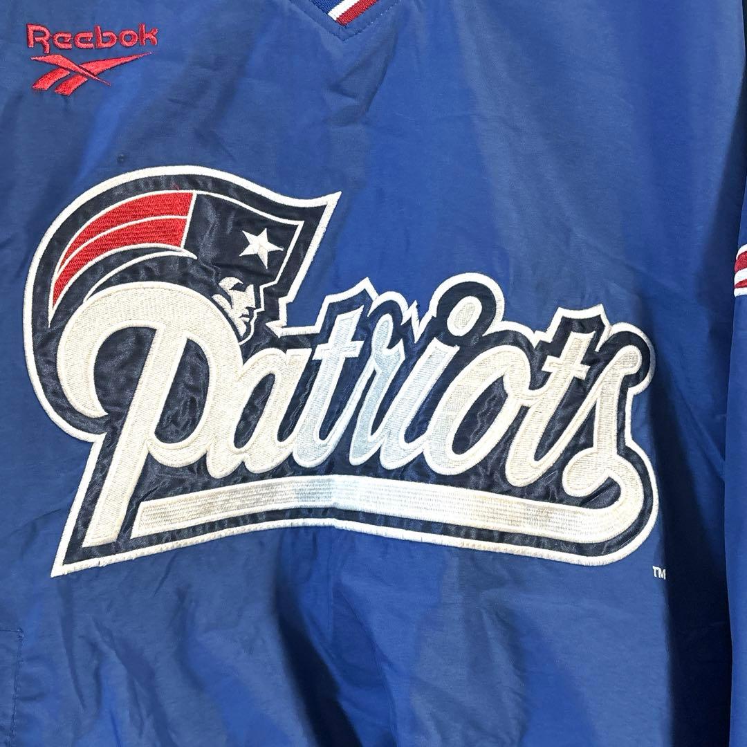 90s US古着　Reebok NFL ナイロンプルオーバー　M 青バック刺繍