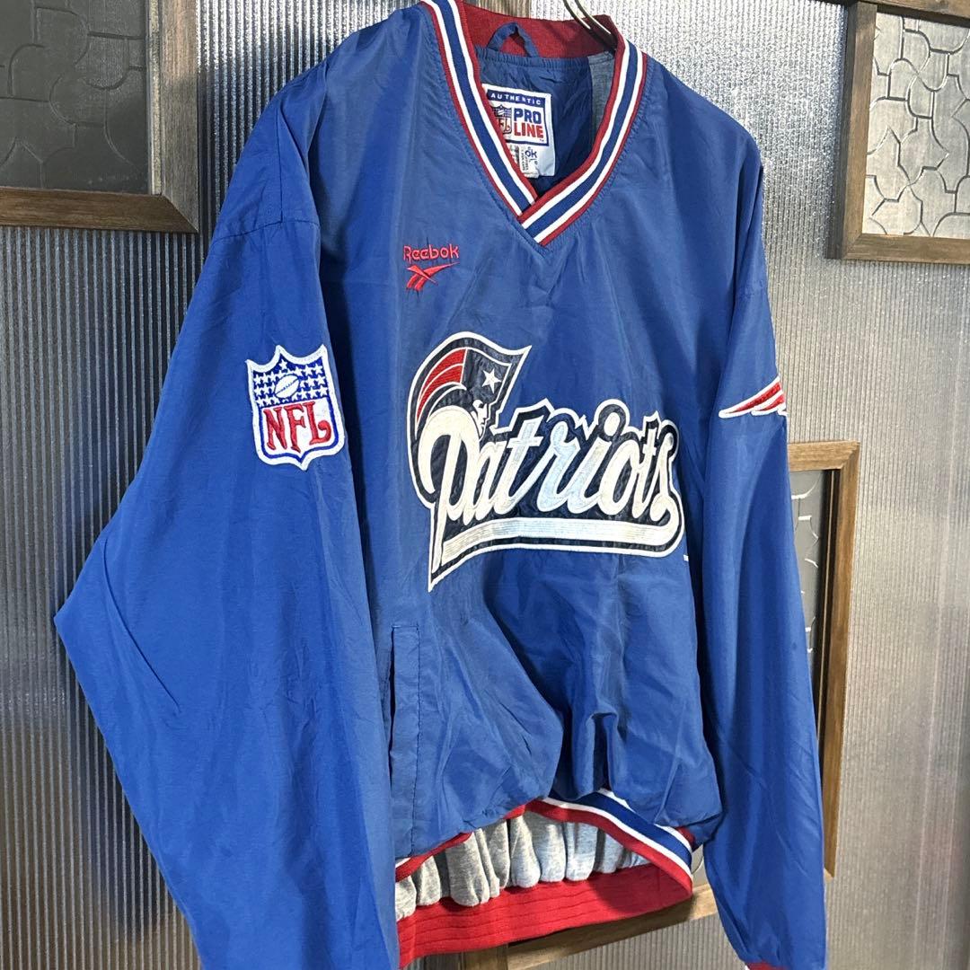 90s US古着　Reebok NFL ナイロンプルオーバー　M 青バック刺繍