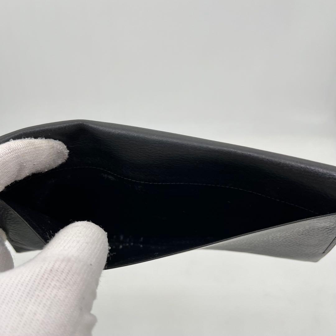 イヴサンローラン 長財布 フラップ 折りたたみ カサンドラ YSLロゴ 黒 本革