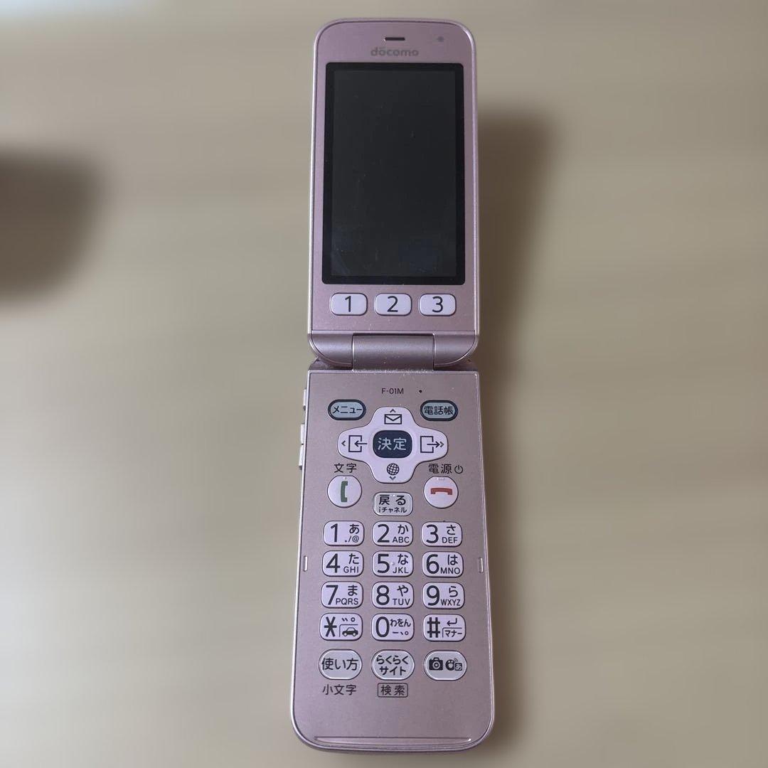 docomo F-01M ピンク 折りたたみ式 卓上フォルダー付き