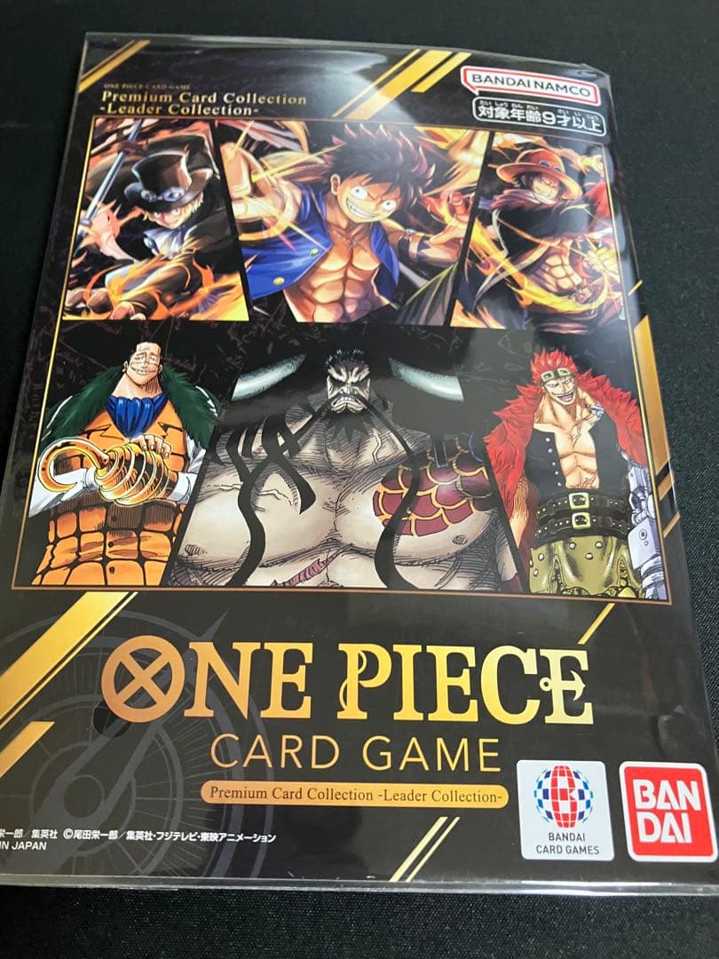 ワンピースカード　プレミアムコレクション等7冊未開封プロモ付25周年REDリーダ
