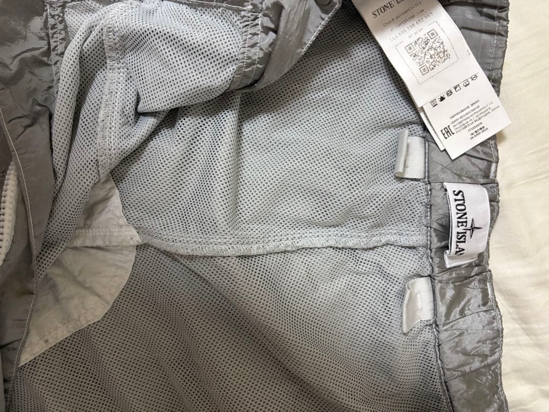 STONE  センタージップナイロンカーゴパンツ