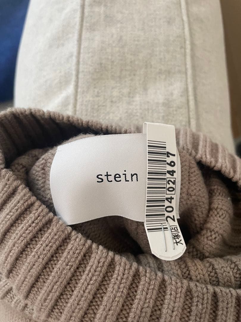 トップス OVERSIZED IMPRESSION HIGH NECK KNIT LS