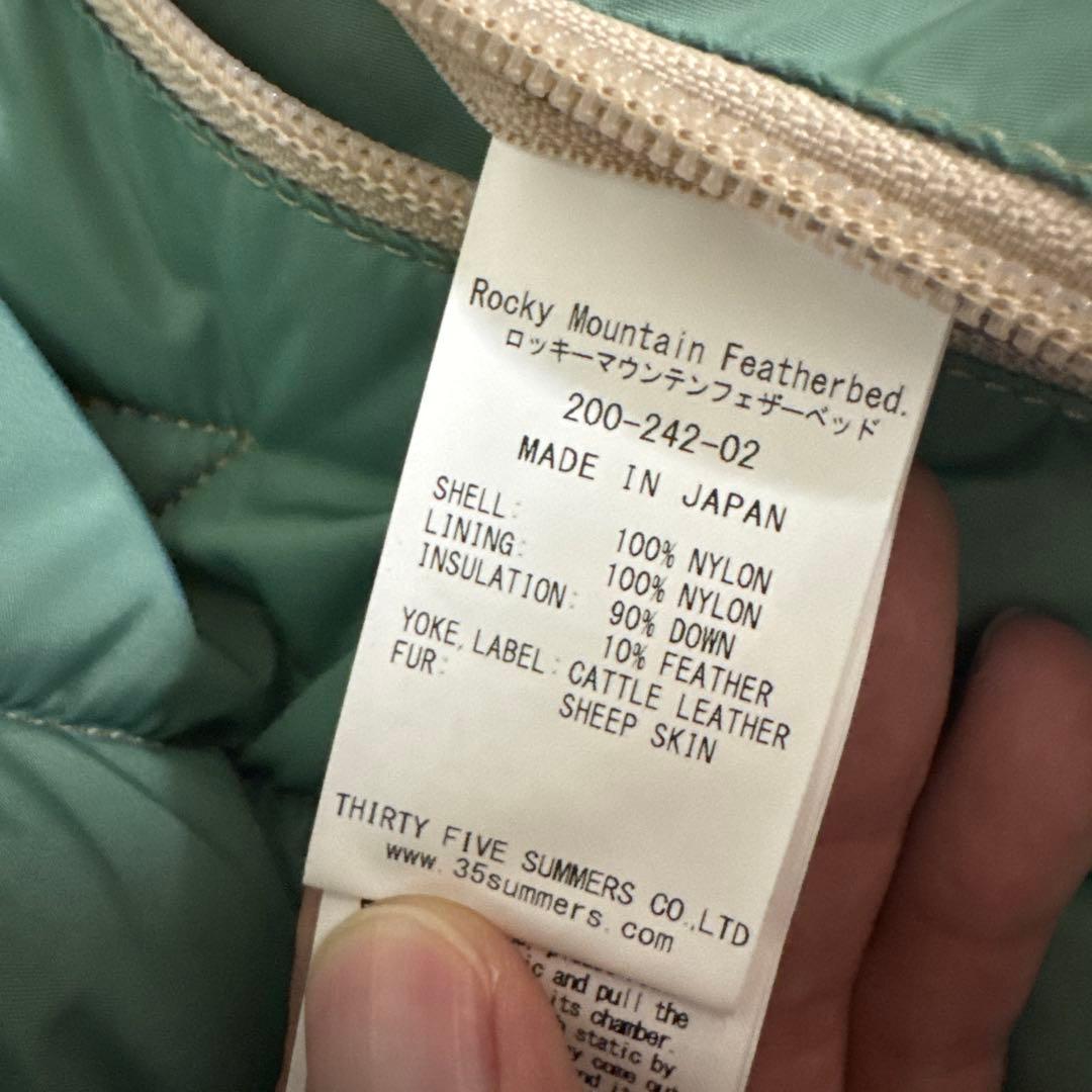 ロッキーマウンテンフェザーベット 新品未使用 ダウンベスト 50周年記念