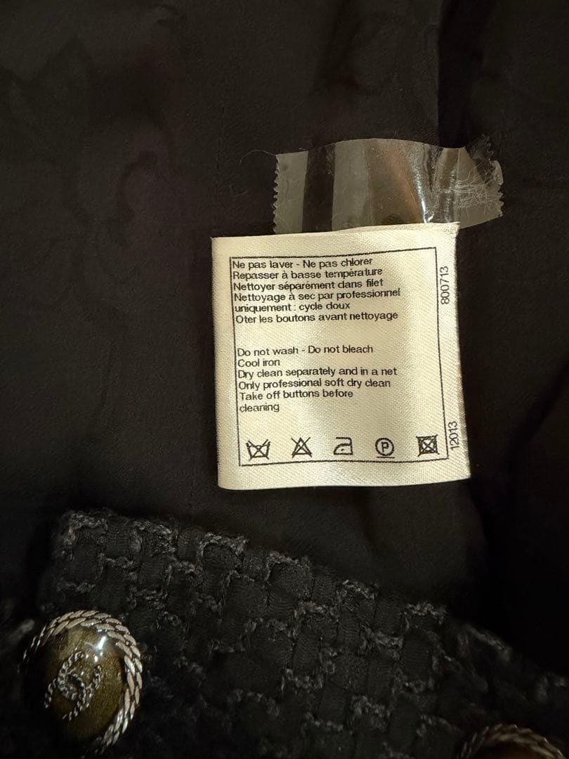 シャネルシャネル黒フリルワンピースサイズ42ツイード素材