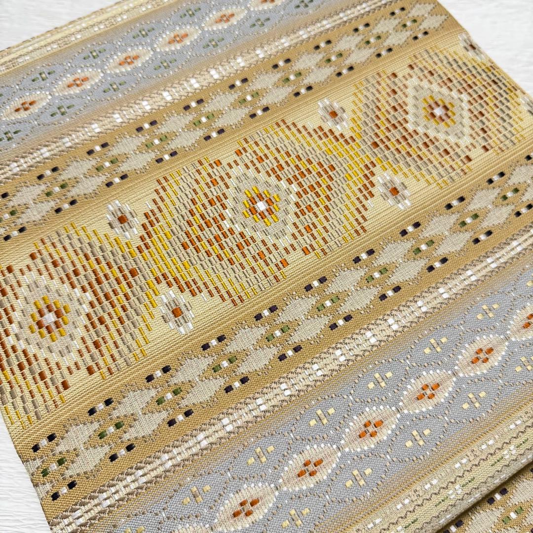 m-22 本場琉球 島花織 幻想雪輪文 袋帯 正絹 2通り 両面 未使用