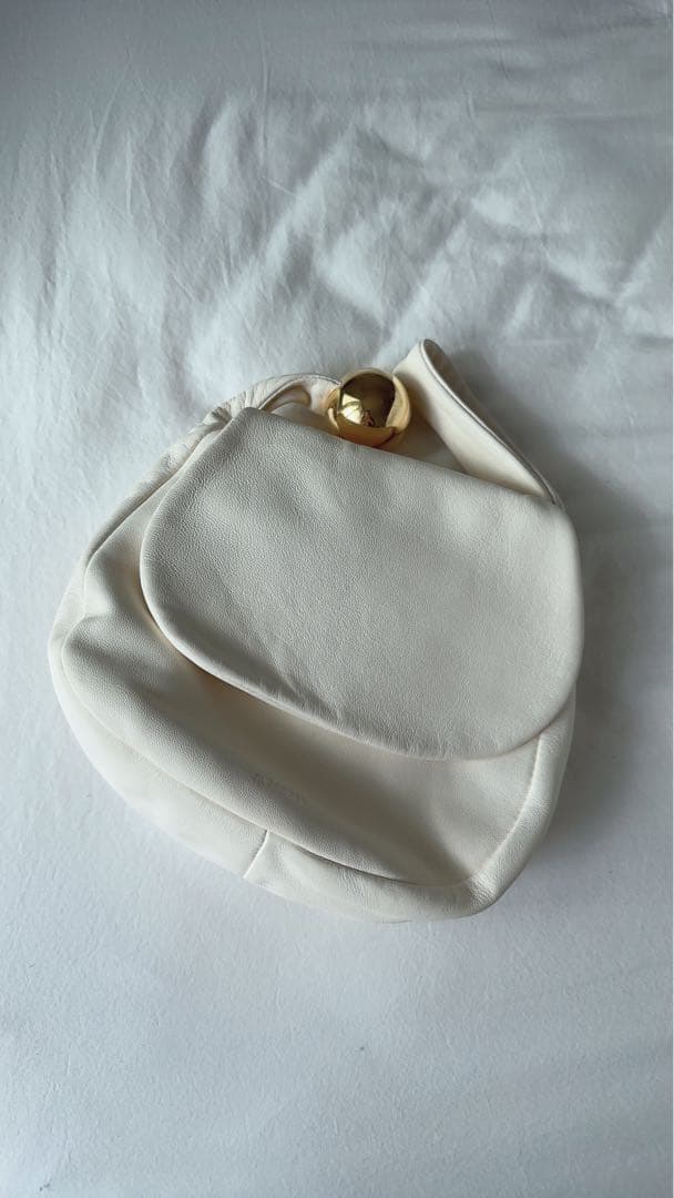 Jil Sander（ジル・サンダー）のホワイトクラッチバッグ /エッグシェル