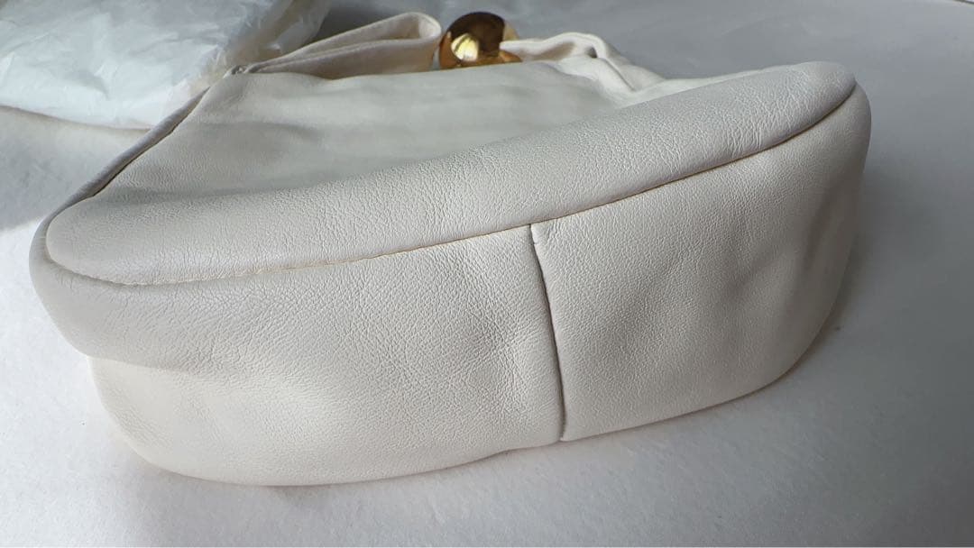 Jil Sander（ジル・サンダー）のホワイトクラッチバッグ /エッグシェル