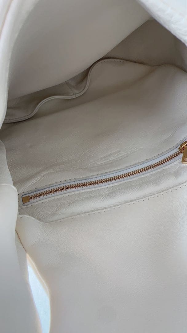 Jil Sander（ジル・サンダー）のホワイトクラッチバッグ /エッグシェル