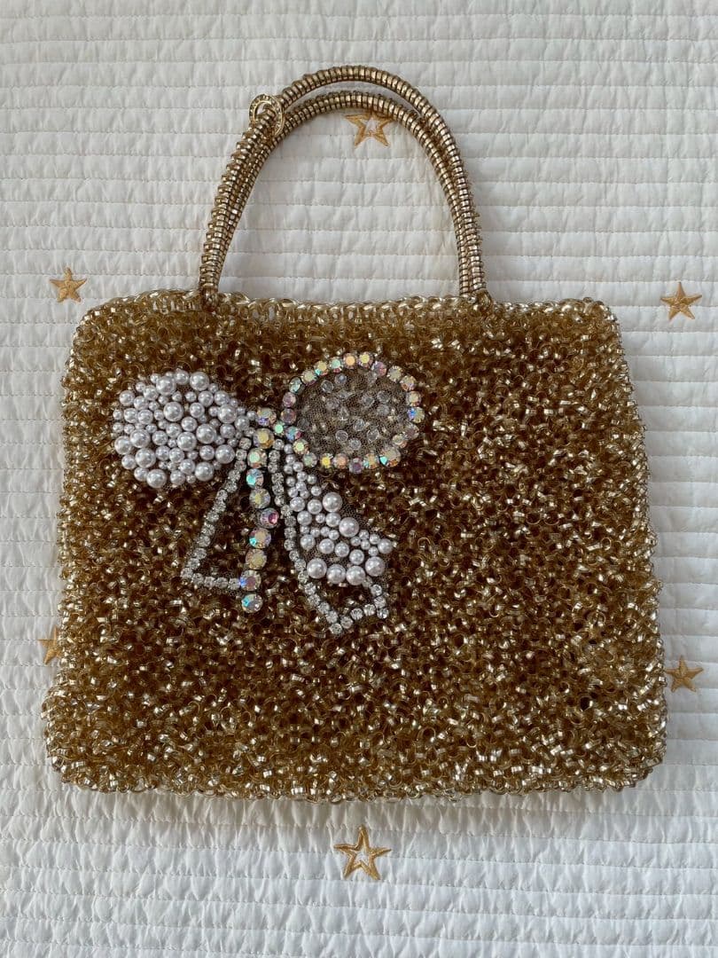 アンテプリマ　ワイヤーバック　リボンモチーフ