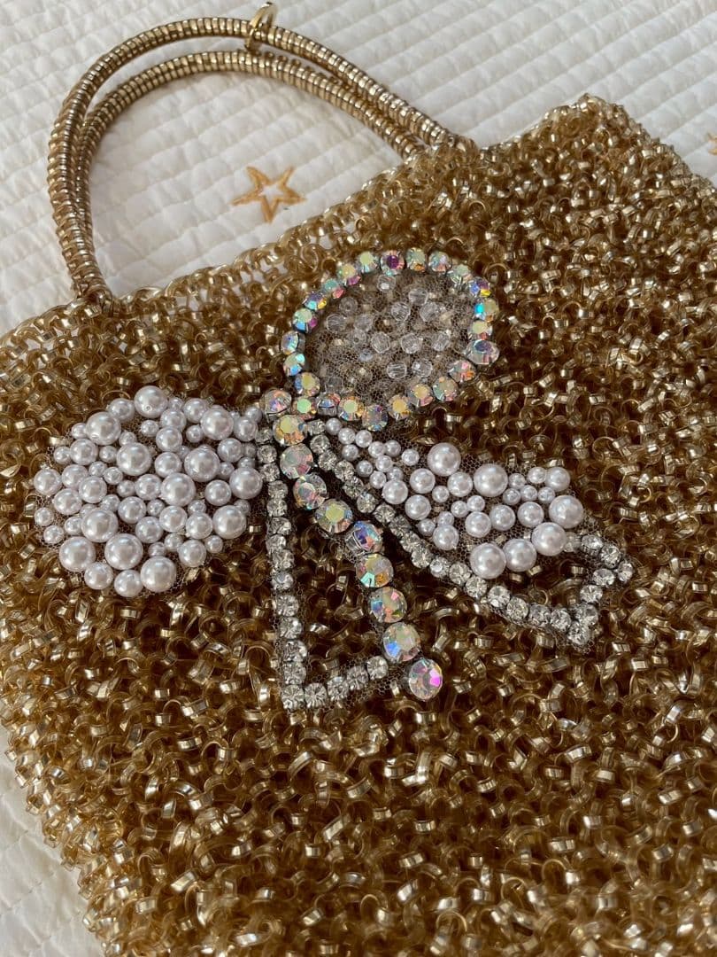 アンテプリマ　ワイヤーバック　リボンモチーフ