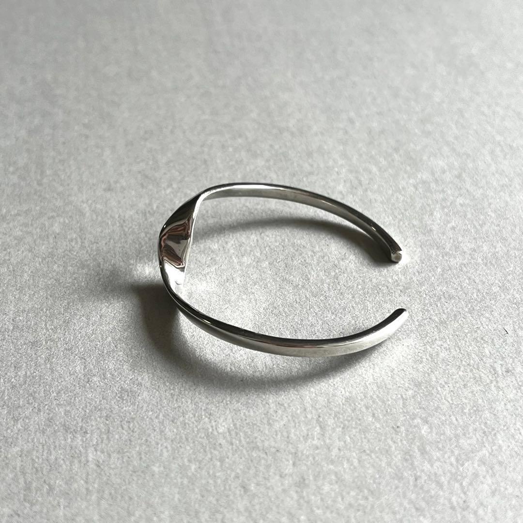 PHILIPPE AUDIBERT ／ツイスト華奢バングル