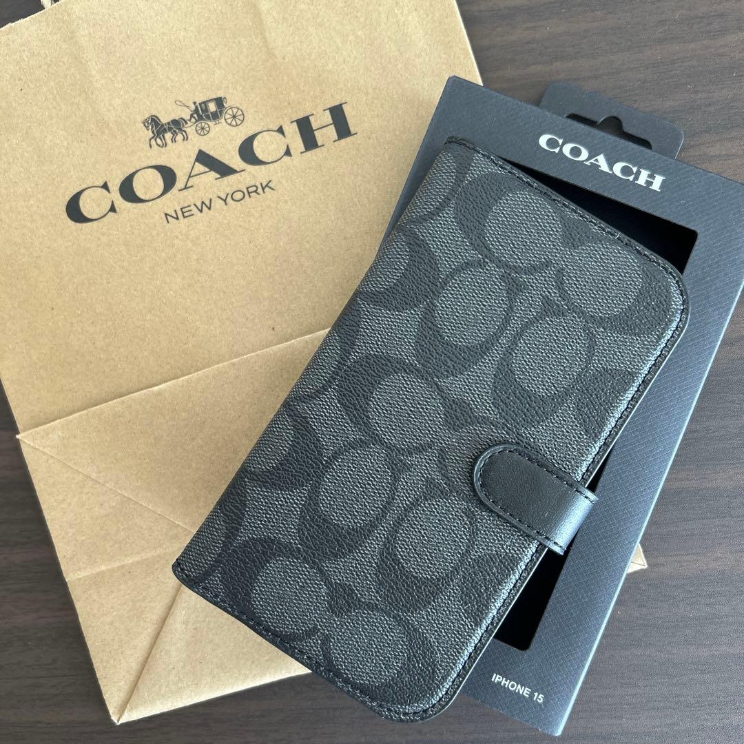 ①【新品】COACH レザー iPhone 15 ケース　手帳型スマホケース