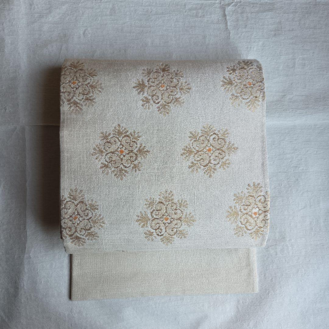 上品な織と煌めき　華文様の袋帯