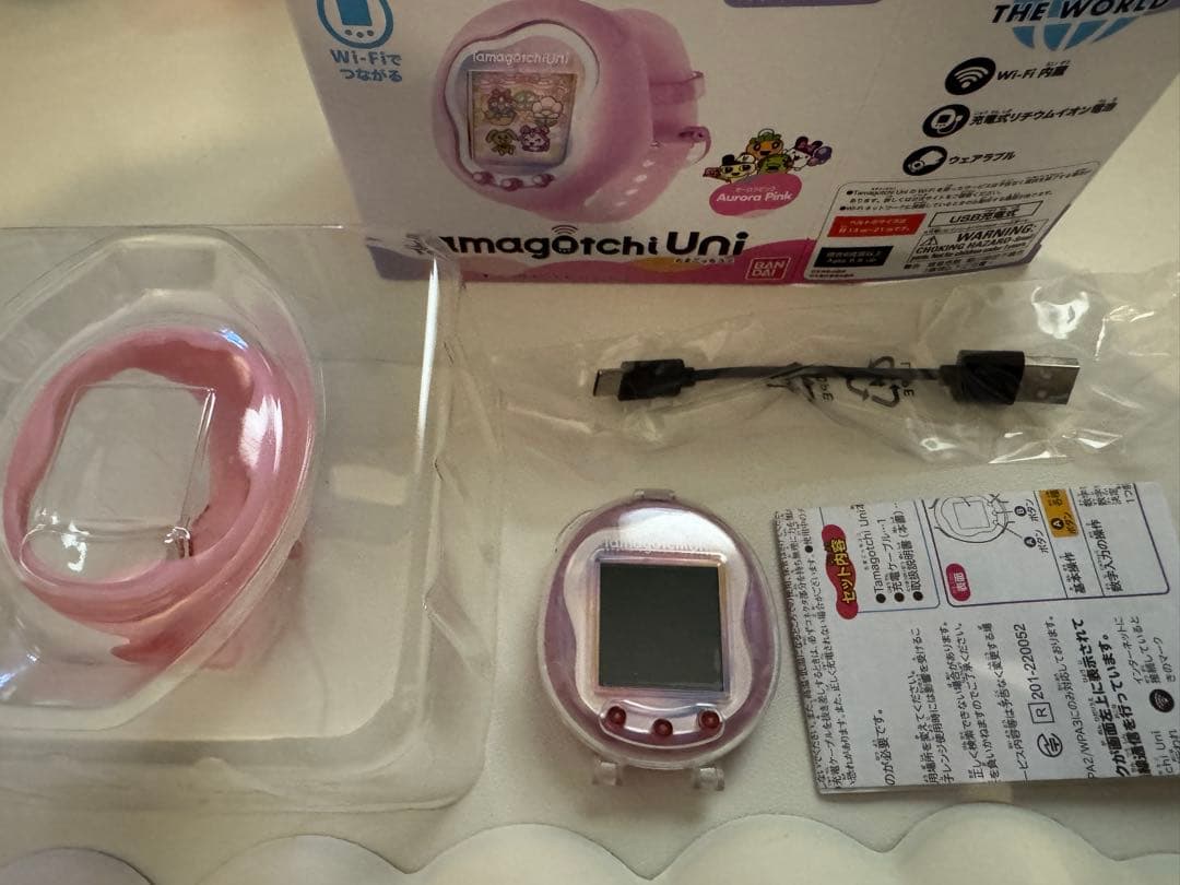 たまごっちユニ 保護フィルム、クリアケース付き