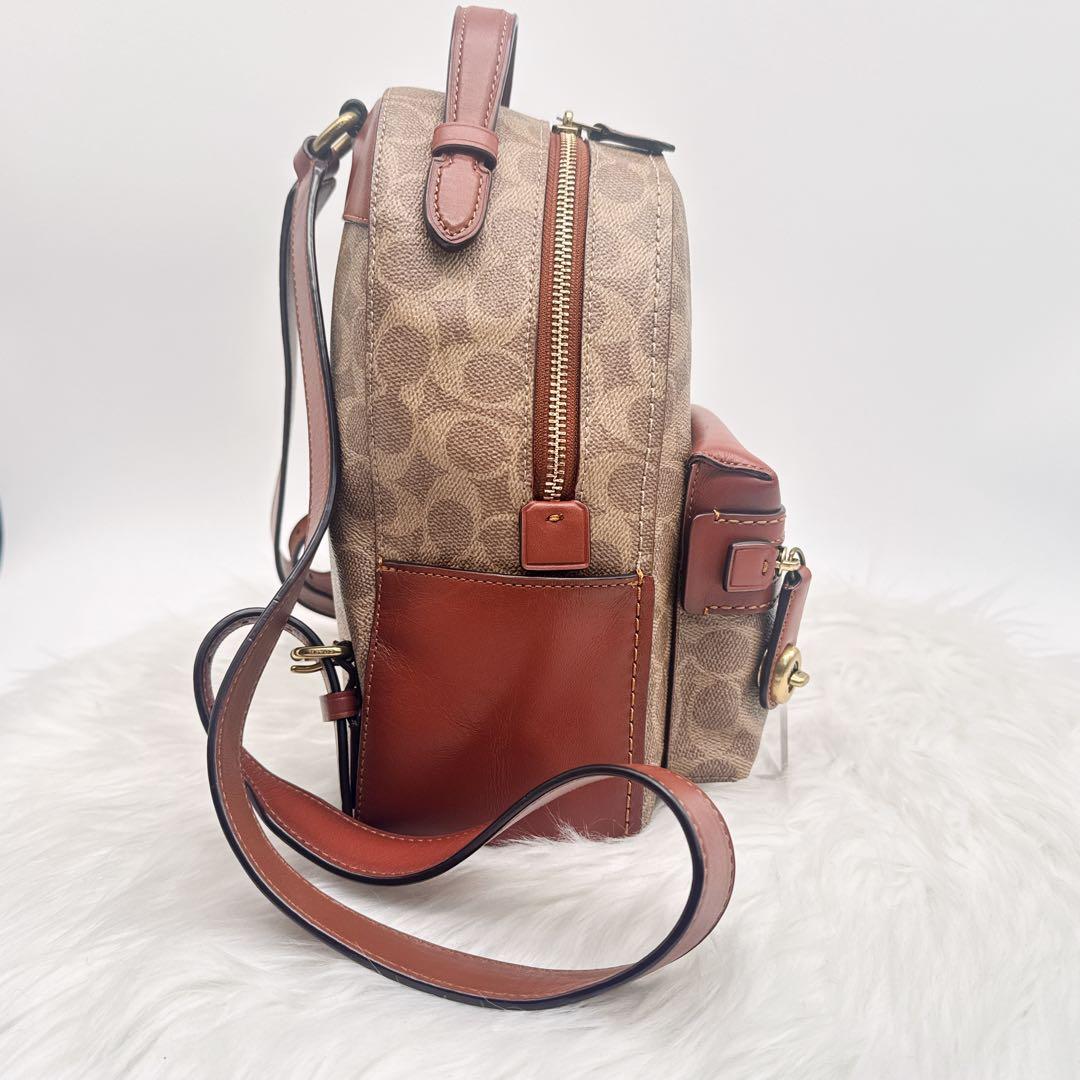 美品✨ COACH PVC レザー ターンロック シグネチャーミニリュック