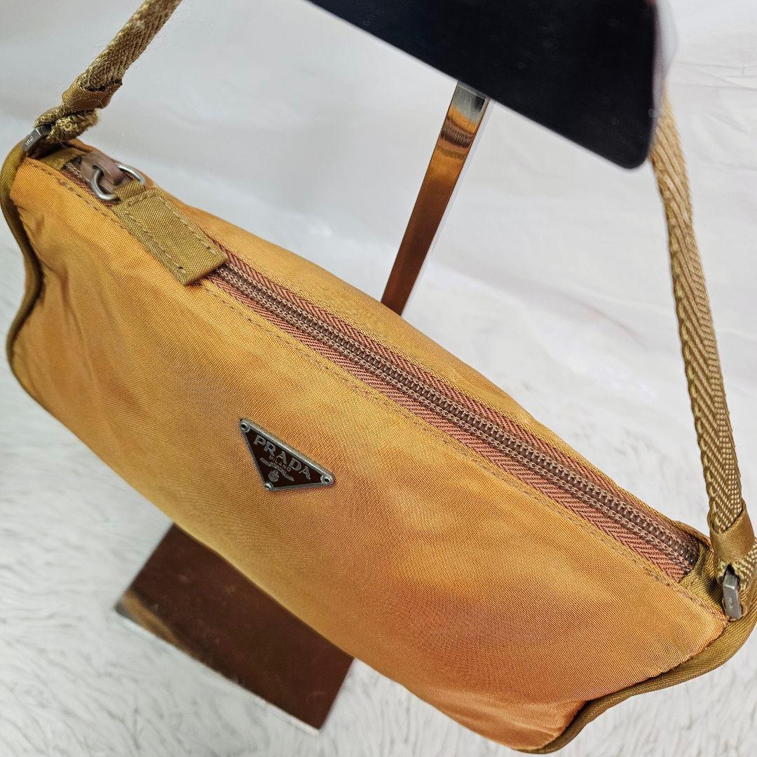 PRADA アクセサリーポーチ 三角ロゴ ナイロン オレンジ